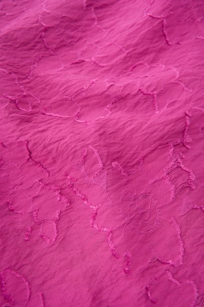 Roze wikkeljurk met lange mouwen en bloemenprint