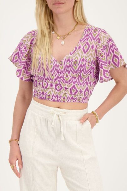 Lilafarbenes Oberteil mit Aztekenmuster