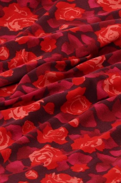Pantalon large violet avec imprimé rose