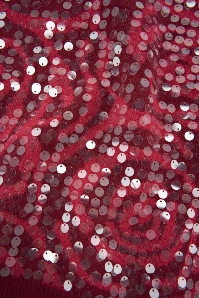 Pull en jacquard rouge avec paillettes