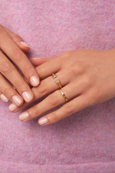 Ring with white open hearts