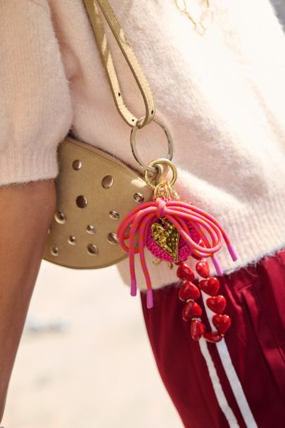 Pink bag charm happy