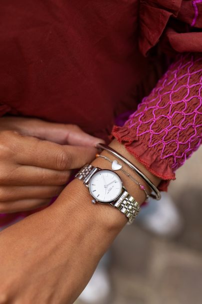 Chain strap watch with white round watch face