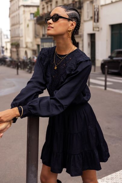 Dark blue dress with embroidery and ruffles
