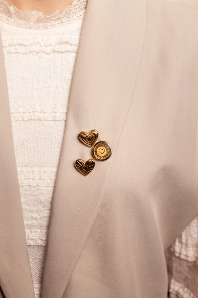 Iconic broche set goudkleurig