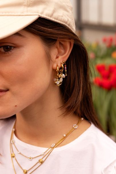 Botanical statement oorringen met bloem en strass steen