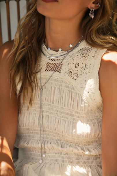 Beige mouwloze top met crochet en open rug