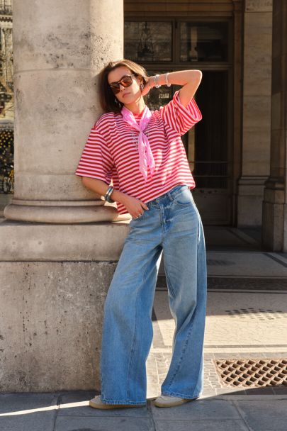 Blue wide leg jeans with asymmetric hem