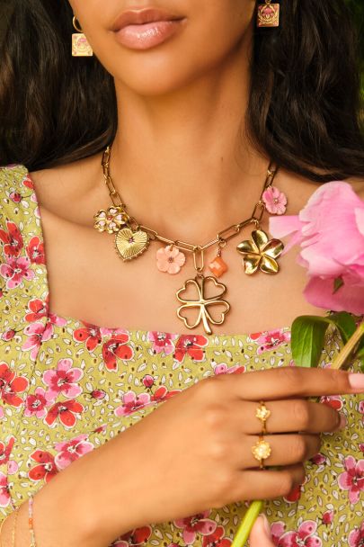 Botanical charm necklace with clover and flowers