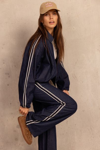 Dark blue denim trousers in sporty look