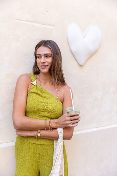Groene one-shoulder top met structuur