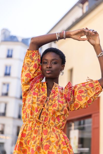 Gele jurk met bloemenprint & ruffles