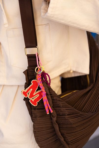 Roze bag charm met kralen