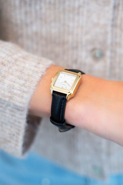 Square watch with black leather strap