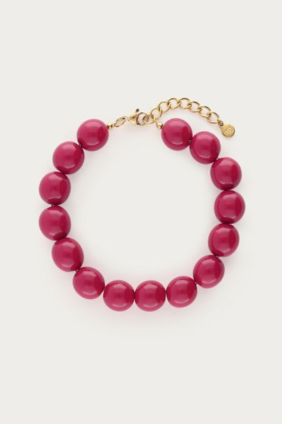 Statement armband met fuchsia kralen