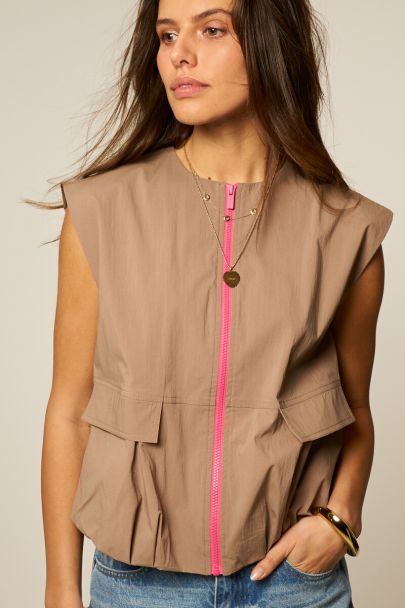 Taupe gilet in balloon look with pink zip