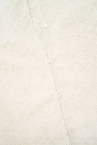 Witte harige top met lange mouwen