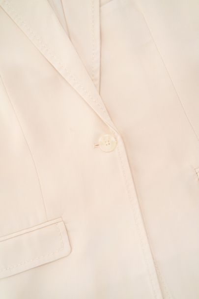 Veston sans manches blanc avec coutures