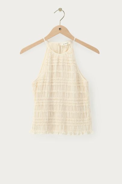 Witte haltertop met ruffles