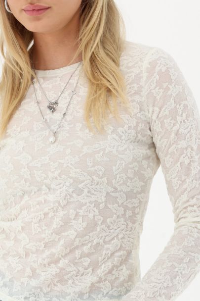 White lace top with round neckline