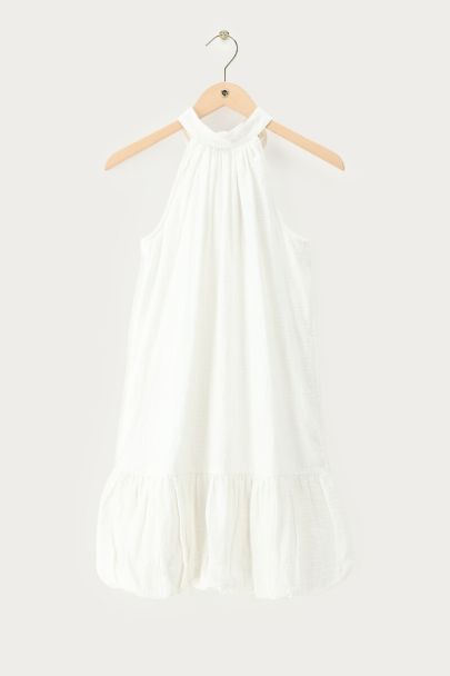 Witte mousseline halterjurk
