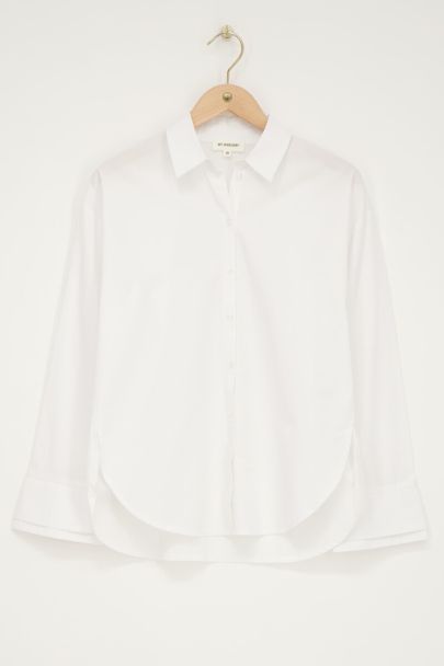 White oversized blouse with double cuff