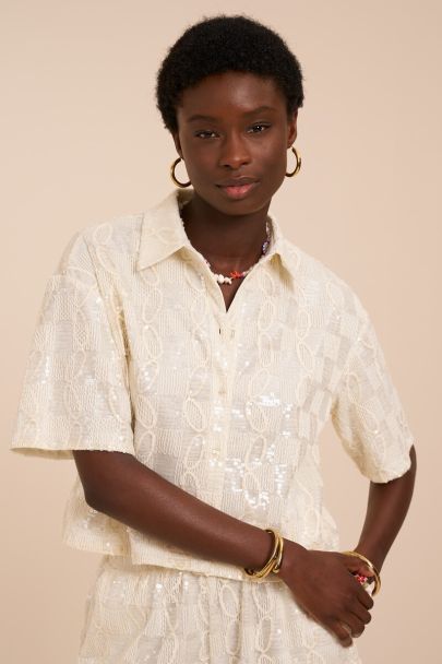 Blouse blanche &agrave; manches courtes et sequins 