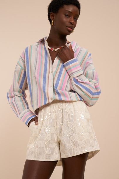 Short &agrave; &eacute;lastique blanc et sequins