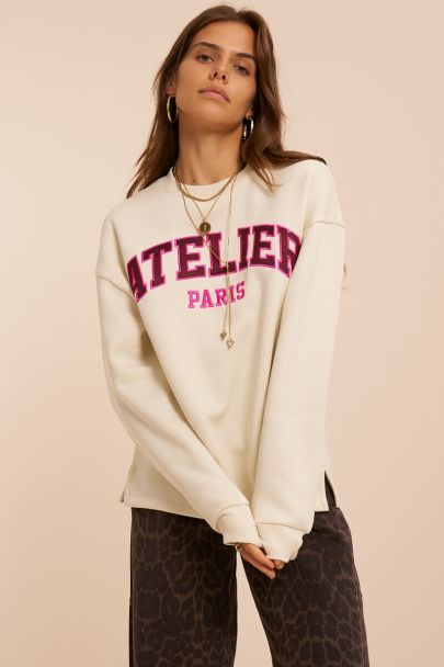 Witte sweater met satijnen look opdruk 'Atelier Paris'