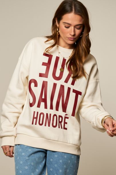 White sweatshirt with red print "Rue saint honore"