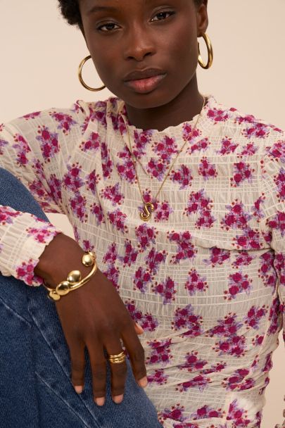 Witte top met lange mouwen en bloemenprint