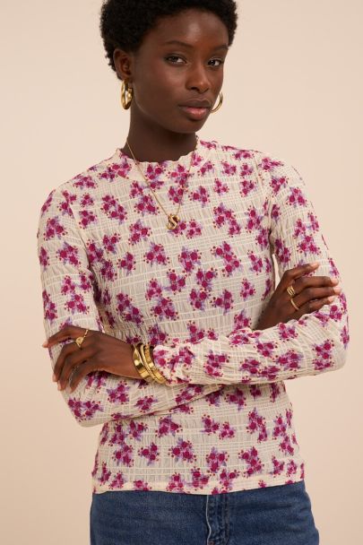 Witte top met lange mouwen en bloemenprint