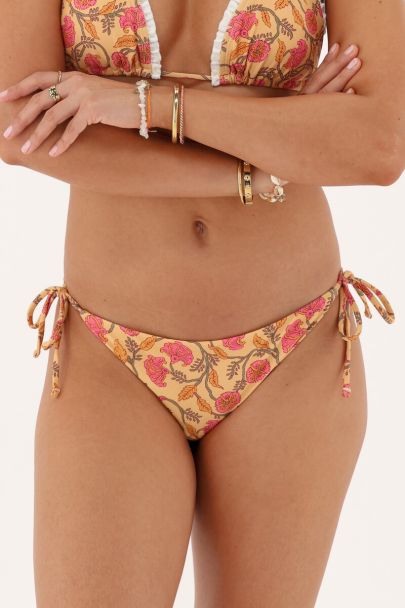 Geel bikini broekje met bloemen en strikbandjes