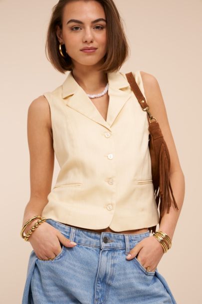 Yellow gilet with buttons