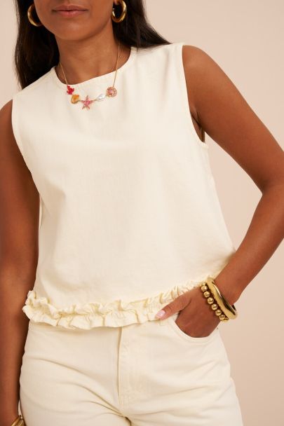 Gele mouwloze top met ruffles