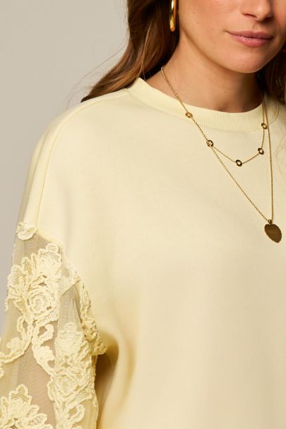 Yellow sweater with fancy embroidery sleeves