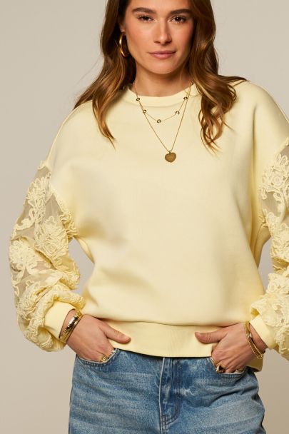 Yellow sweater with fancy embroidery sleeves