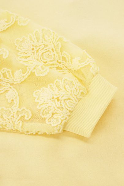 Yellow sweater with fancy embroidery sleeves