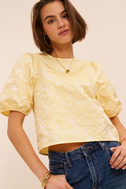 Yellow top with floral relief and puff sleeves
