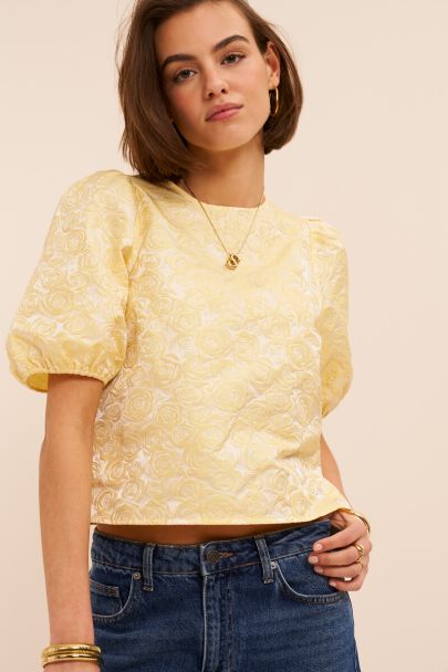 Yellow top with floral relief and puff sleeves