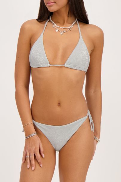 Zilverkleurig bikini broekje met lurex en strikbandjes 