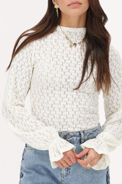 Top en dentelle blanche avec manchette