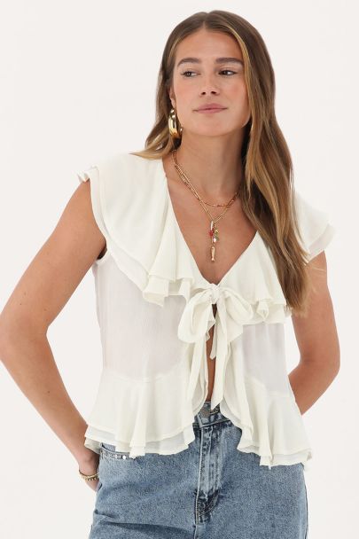 White ruffle top with bow