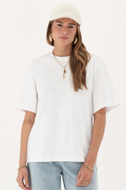 Wit T-shirt met oranje "Riviéra"