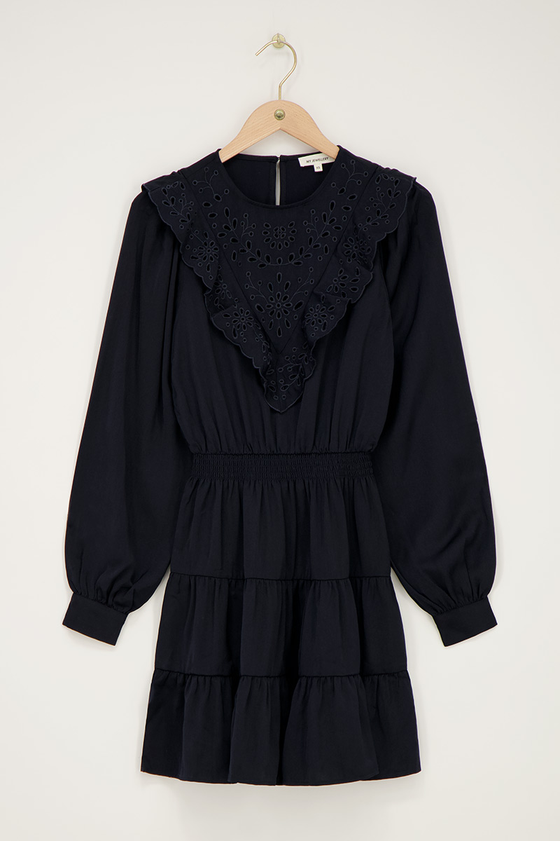 Dark blue dress with embroidery and ruffles