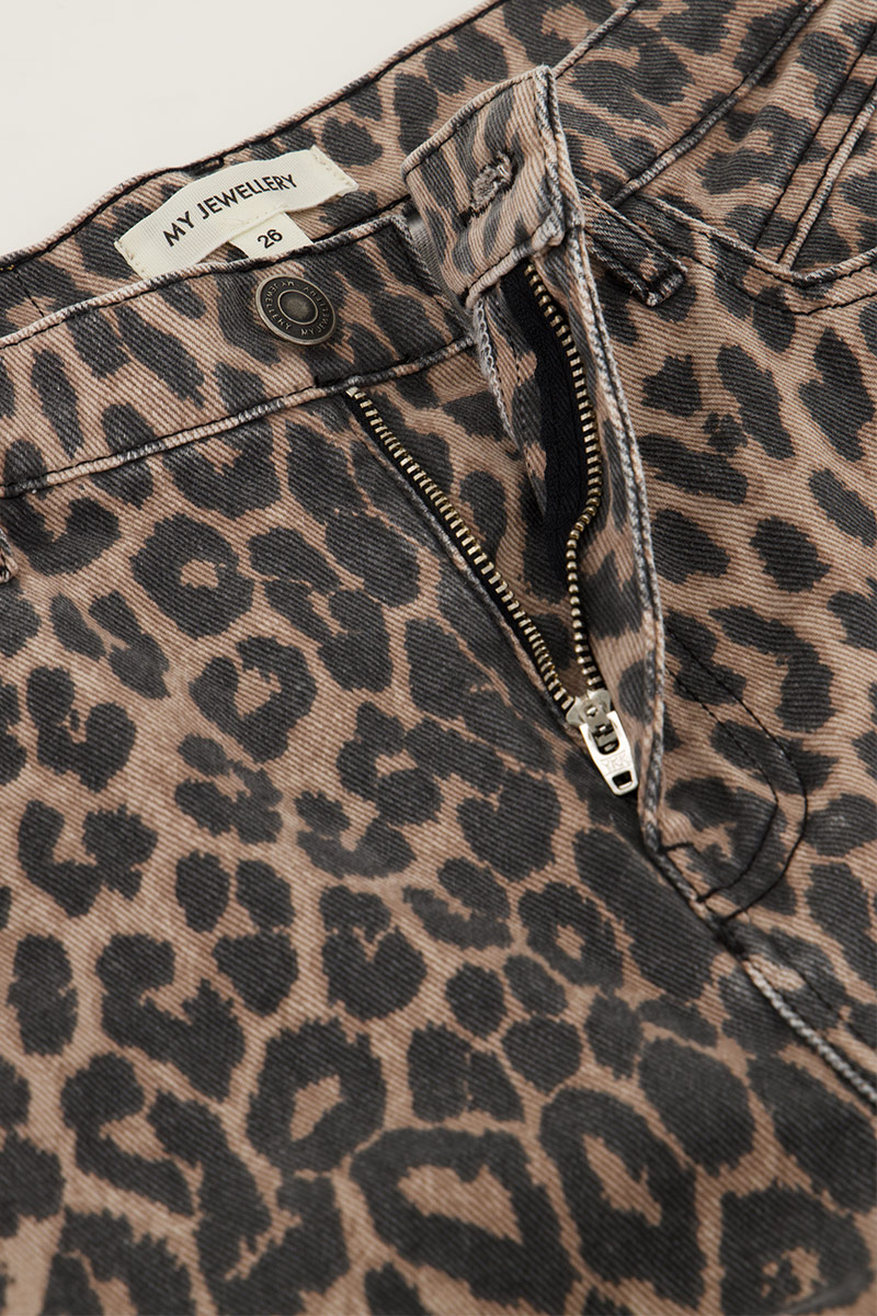 Denim jeans with panther print