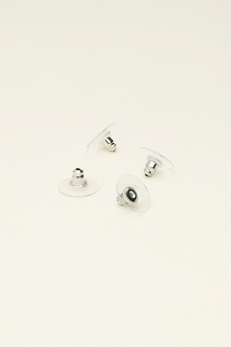 Vier Ohrringverschlüsse aus Plastik