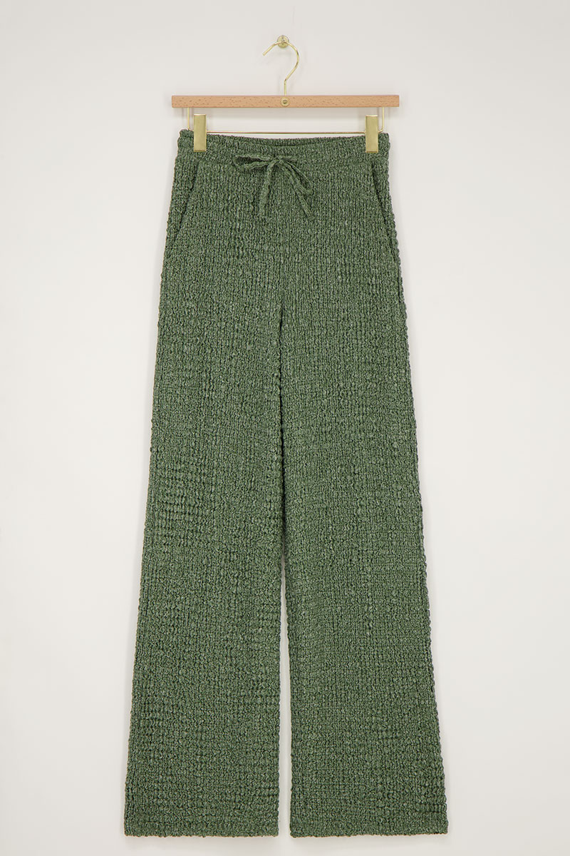 green wide leg trousers with texture