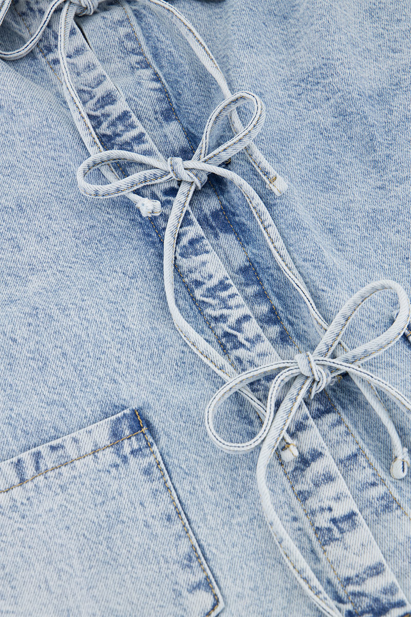 Light blue denim jacket with bows | My Jewellery