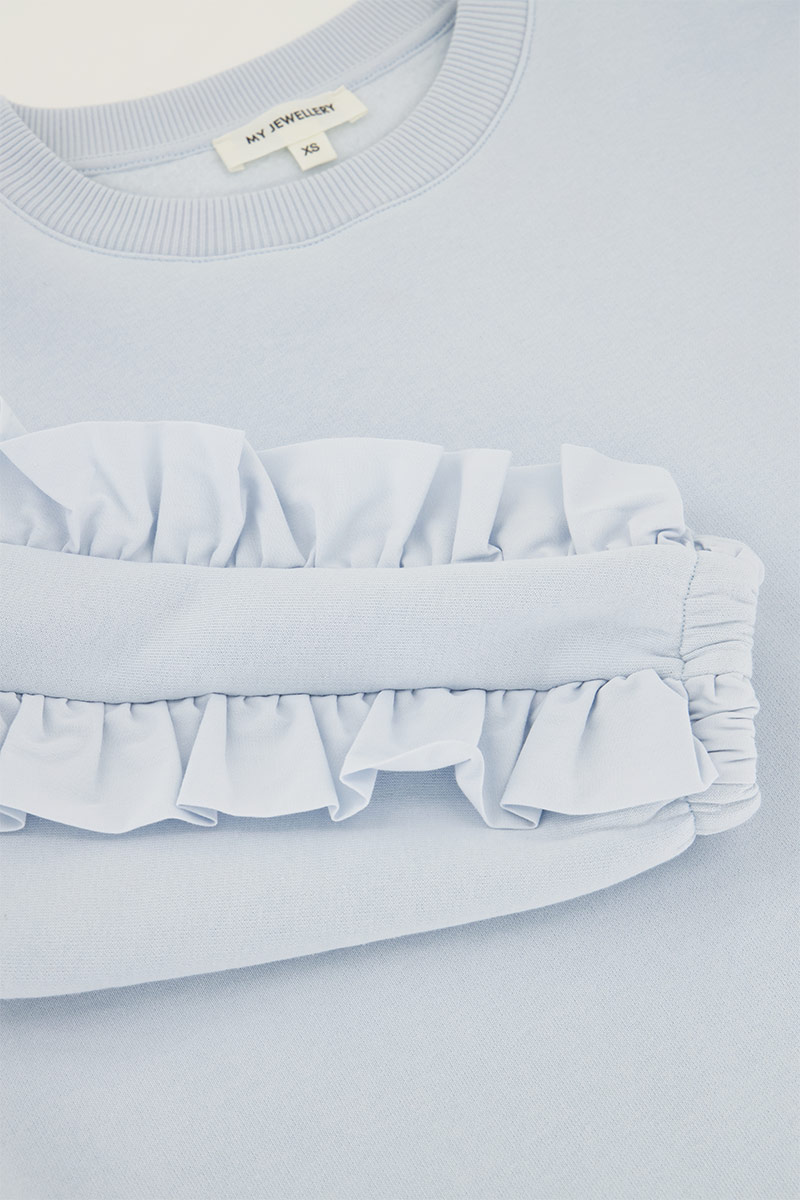Light blue woven sweater with ruffle | My Jewellery